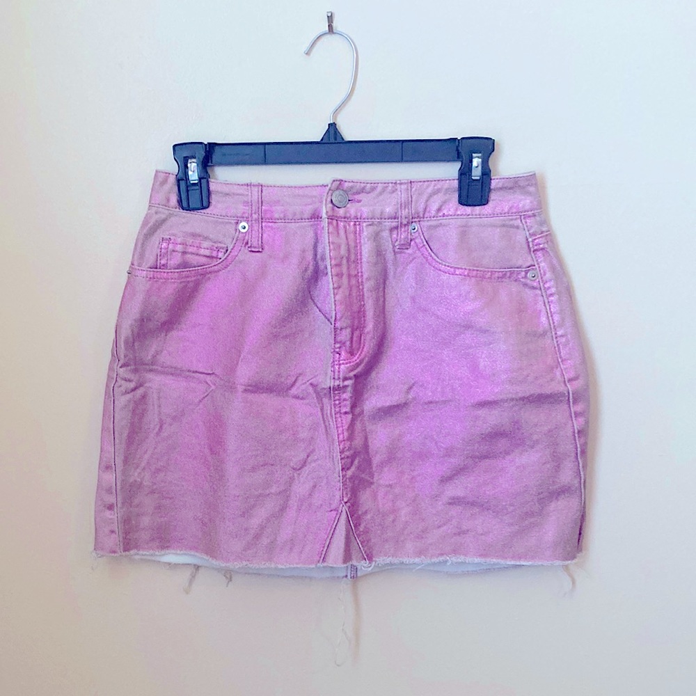 Cute pink Jean style skirt. Sparkly when you get up closer to it. Size 4